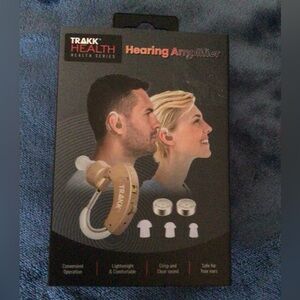Trakk Health hearing amplifier with batteries. New in package